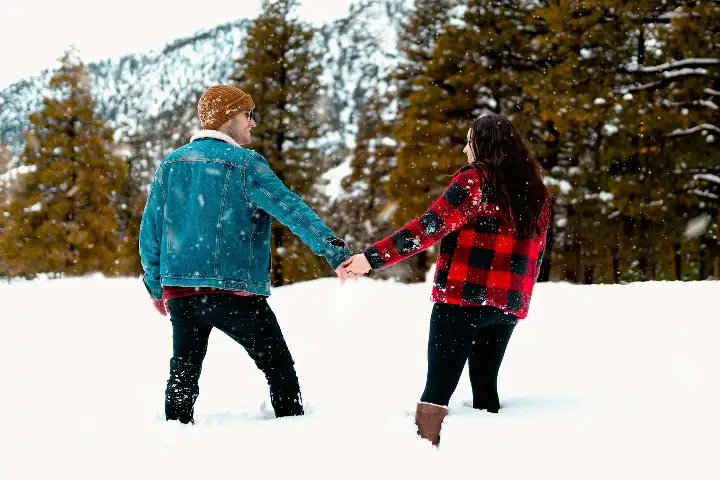 Couples enjoying in snow