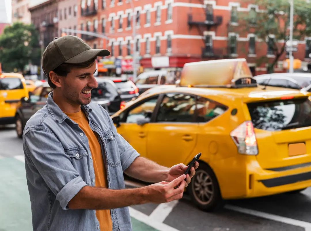 a man conveniently booking his cab